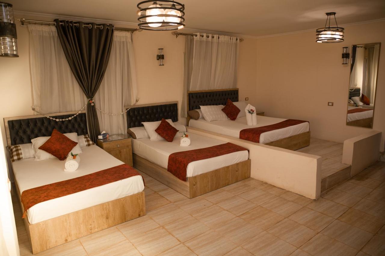 קהיר Heru Pyramids View Hotel מראה חיצוני תמונה